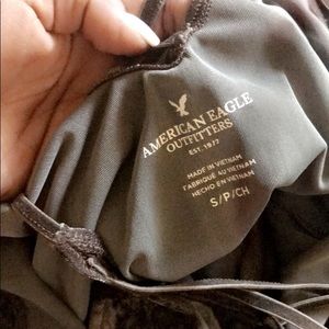 All green crushed velvet spaghetti strap top